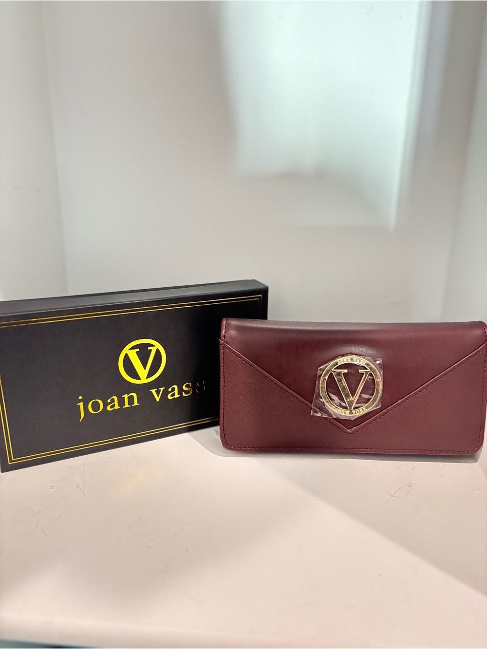 Joan Vass Burgundy Leather Envelope Card Holder with Gold Emblem